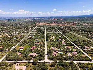 Cropland Prints: aerial view of an urbanization of country houses with symmetrical streets. Riaza Segovia