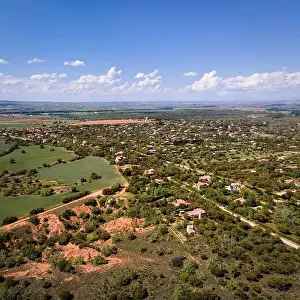 Cropland Prints: aerial view of an urbanization of country houses with symmetrical streets. Riaza Segovia