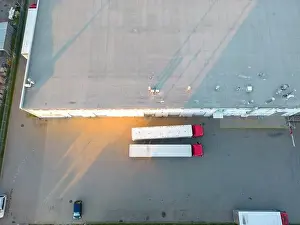 Aerial view of warehouse storages or industrial factory or logistics center from above