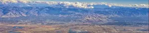 Aerial view of Wasatch Front Rocky Mountain landscapes on flight over Colorado and Utah during winter