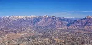 Aerial view of Wasatch Front Rocky Mountain landscapes on flight over Colorado and Utah during winter