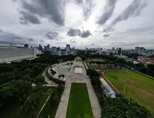 Aerial view of West Irian Liberation monument in downtown Jakarta and noise cloud with Jakarta cityscape