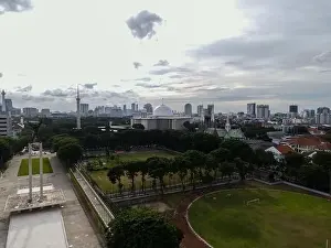 Liberation Prints: Aerial view of West Irian Liberation monument in downtown Jakarta and noise cloud with Jakarta cityscape