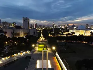 Liberation Prints: Aerial view of West Irian Liberation monument in downtown Jakarta and noise cloud when sunset with Jakarta cityscape