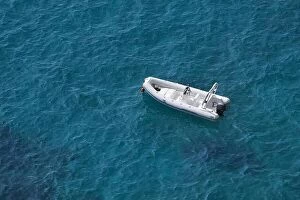 Images Dated 24th September 2016: Aerial view of a white speed boat on a blue clear sea water
