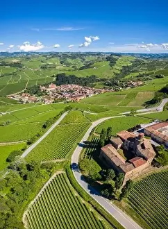 Aerial view of the winding road leading to the Castello di La Volta