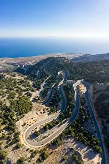 Bending Prints: Aerial view of the winding road to the town of Hora Skafion on the south coast of Crete
