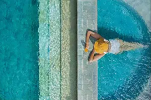 Mid Adults Prints: Aerial view of woman in swimming pool