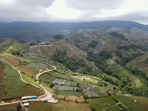 Landmark Tower Prints: Aerial view of World heritage Panyaweuyan rice terraces in Majalengka with noise cloud