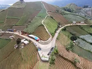 Landmark Tower Prints: Aerial view of World heritage Panyaweuyan rice terraces in Majalengka with noise cloud