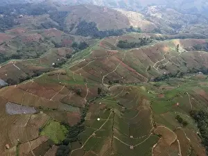 Aerial view of World heritage Panyaweuyan rice terraces in Majalengka with noise cloud