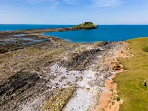 Aerial Shot Prints: Aerial view of Worm's Head and peninsula near Rhossili on the Welsh coast