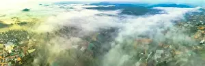 Barley Prints: Aerial view of the Xuan Tho suburbs near Da Lat city at morning with misty sky in Vietnam highlands