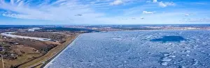 Daugava Prints: Aerial winter view of the huge dam in Latvia near city of Salaspils and Riga
