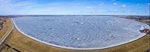 Daugava Prints: Aerial winter view of the huge dam in Latvia near city of Salaspils and Riga