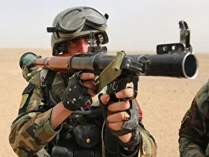 Commando Prints: An Afghan National Army commando with Special Operations Kandak tests the sight picture of an RPG-7 rocket-propelled