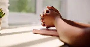 Pouring Prints: African American Black Christian. Bible In Prayer Hands