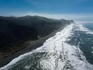 Brookings Prints: Afternoon sunlight shines on the Pacific Ocean washing onto Gold Beach along the scenic southern coast of Oregon