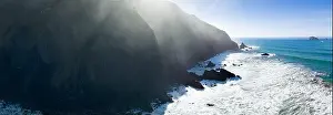 Afternoon sunlight shines on the scenic southern coast of Oregon. This rugged region is found in the Samuel H. Boardman State Scenic Corridor
