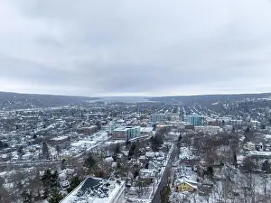 Afternoon winter aerial video of the area surrounding the City of Ithaca, NY, USA