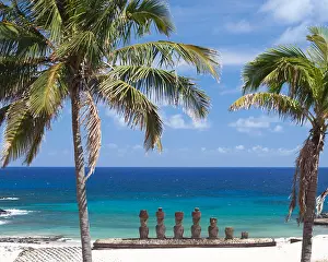 In A Row Prints: Ahu Nao-Nao, a stone platform with 7 moai on Anakena white coral sand beach in Rapa Nui National Park overlooking a