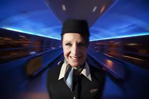 Air Atlanta Icelandic air hostess at Manchester Airport inside the skylink tube