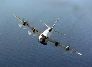 An air-to-air front view of an EP-3E Orion aircraft from Fleet Air Reconnaissance Squadron 2 (VQ-2)