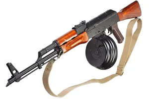Trigger Prints: AKM (Avtomat Kalashnikova) Kalashnikov assault rifle with 75 Round Drum Magazine isolated