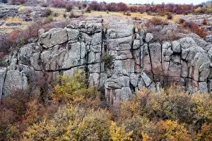 Mertvovod Prints: Aktovsky Canyon, Ukraine. Autumn trees and large stone boulders around