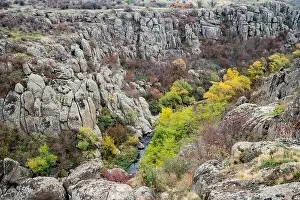 Flows Prints: Aktovsky Canyon, Ukraine. Autumn trees and large stone boulders around