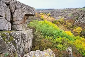 Flows Prints: Aktovsky Canyon, Ukraine. Autumn trees and large stone boulders around