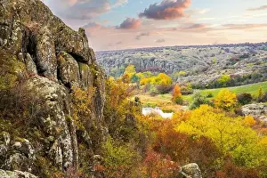 Aktovsky Canyon, Ukraine. Autumn trees and large stone boulders around
