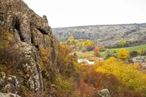 Flows Prints: Aktovsky Canyon, Ukraine. Autumn trees and large stone boulders around