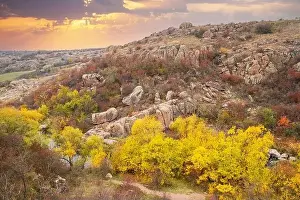 Aktovsky Canyon, Ukraine. Autumn trees and large stone boulders around