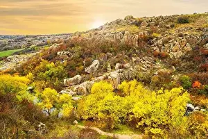 Flows Prints: Aktovsky Canyon, Ukraine. Autumn trees and large stone boulders around