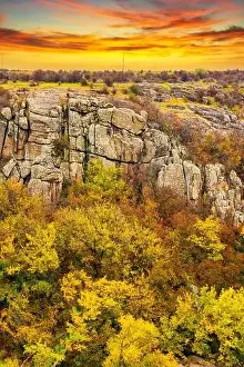 Flows Prints: Aktovsky Canyon, Ukraine. Autumn trees and large stone boulders around