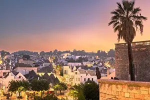 Alberobello, Italy with Trulli houses at dusk