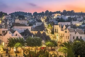 Alberobello, Italy with Trulli houses at dusk