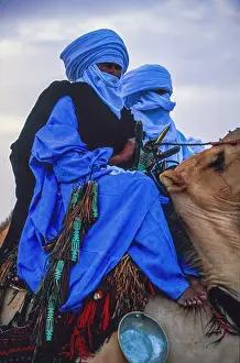 Tuareg Prints: Algeria, Tamanrasset, Tuareg camel parade and their upholstery at the Tafsit festival