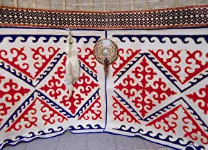 Nomad Prints: ALMATY, KAZAKHSTAN - MARCH 26, 2017: Kazakh felt carpet with ornament inside the yurt in Almaty