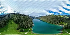 Alpine 360-degree panoramic view from drone, summer day