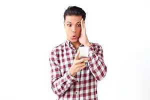 Feel Prints: Amazement man looking at screen phone and watching unbelievable video