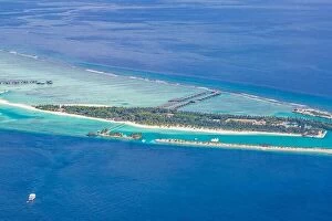 Images Dated 10th December 2015: Amazing aerial view of Maldives island and beach. Drone or airplane view of atoll and island and sea