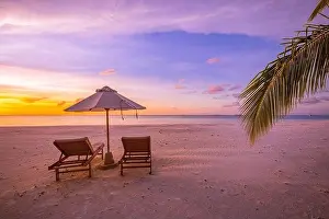 Amazing beach. Chairs on the sandy beach sea. Luxury summer holiday and vacation resort hotel for tourism. Inspirational tropical landscape. Tranquil
