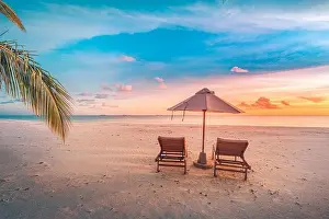 Amazing beach. Chairs on the sandy beach sea. Luxury summer holiday and vacation resort hotel for tourism. Inspirational tropical landscape. Tranquil