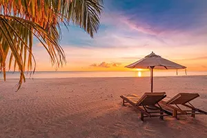 Amazing beach. Chairs on the sandy beach sea. Luxury summer holiday and vacation resort hotel for tourism. Inspirational tropical landscape. Tranquil