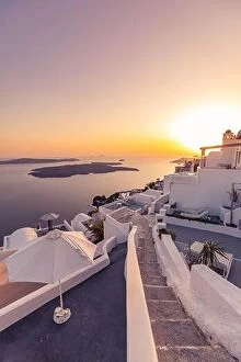 Images Dated 11th October 2019: Amazing evening view over white architecture and romantic sunset light, Santorini, summer romance