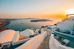 Amazing evening view over white architecture and romantic sunset light, Santorini, summer romance, honeymoon destination. Traveling concept, vacation