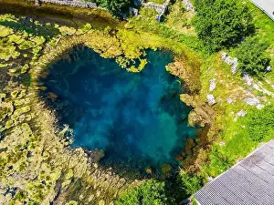 Mountain Spring Prints: Amazing Gacka river source photographed with drone from above located in Majerovo Vrilo