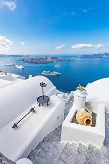 Images Dated 9th October 2019: Amazing landscape of Fira, white architecture caldera view Santorini, Greece, cruise ships